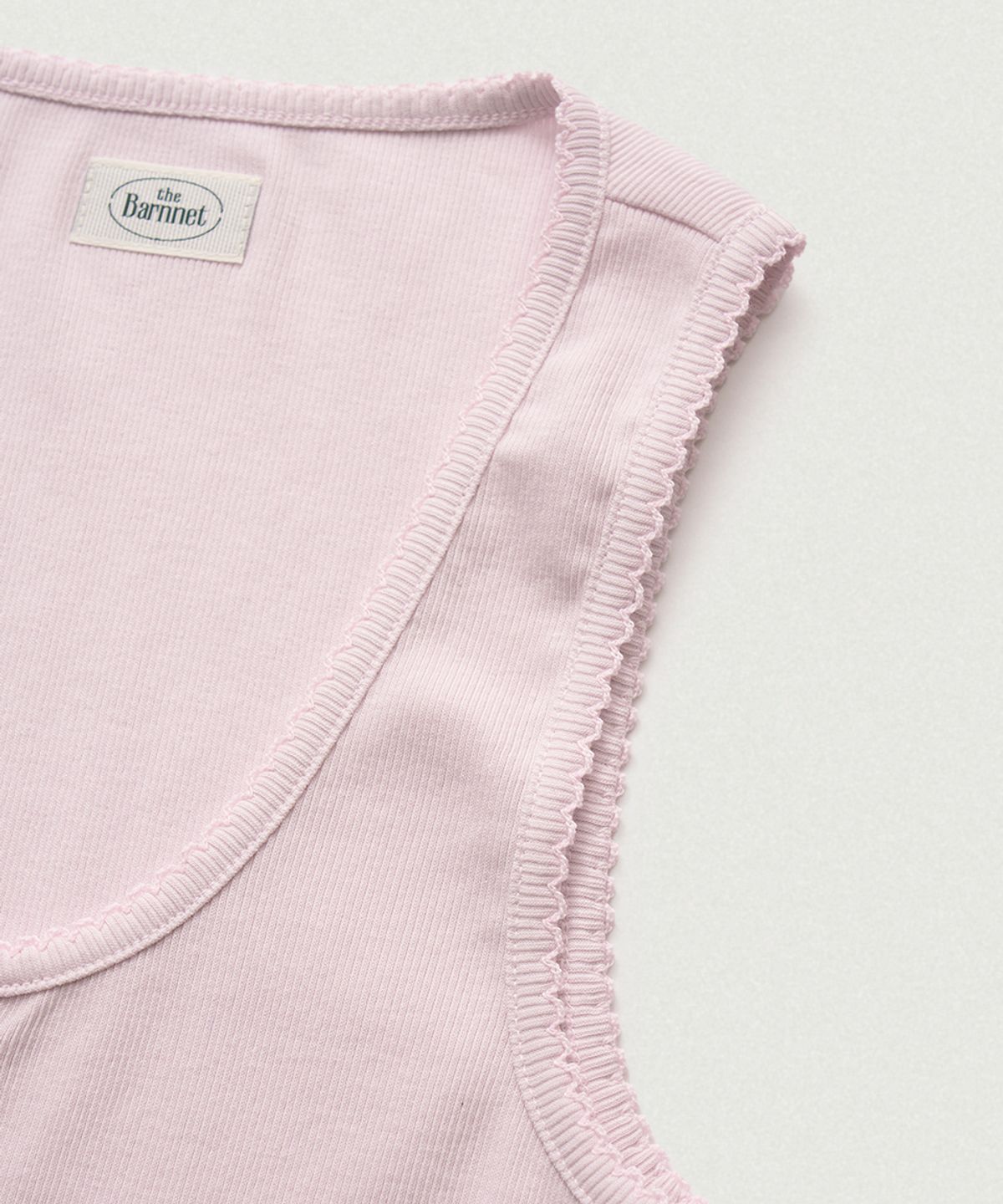 더바넷(THEBARNNET) Clara Button Layer Tank Top_Light Pink