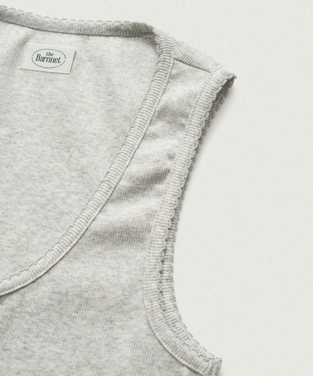 더바넷(THEBARNNET) Clara Button Layer Tank Top_Light Pink