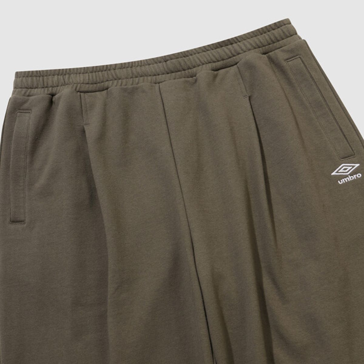 엄브로(UMBRO) U 스포티 니트 와이드 조거 2WAY 팬츠 브라운 UR121CFP15