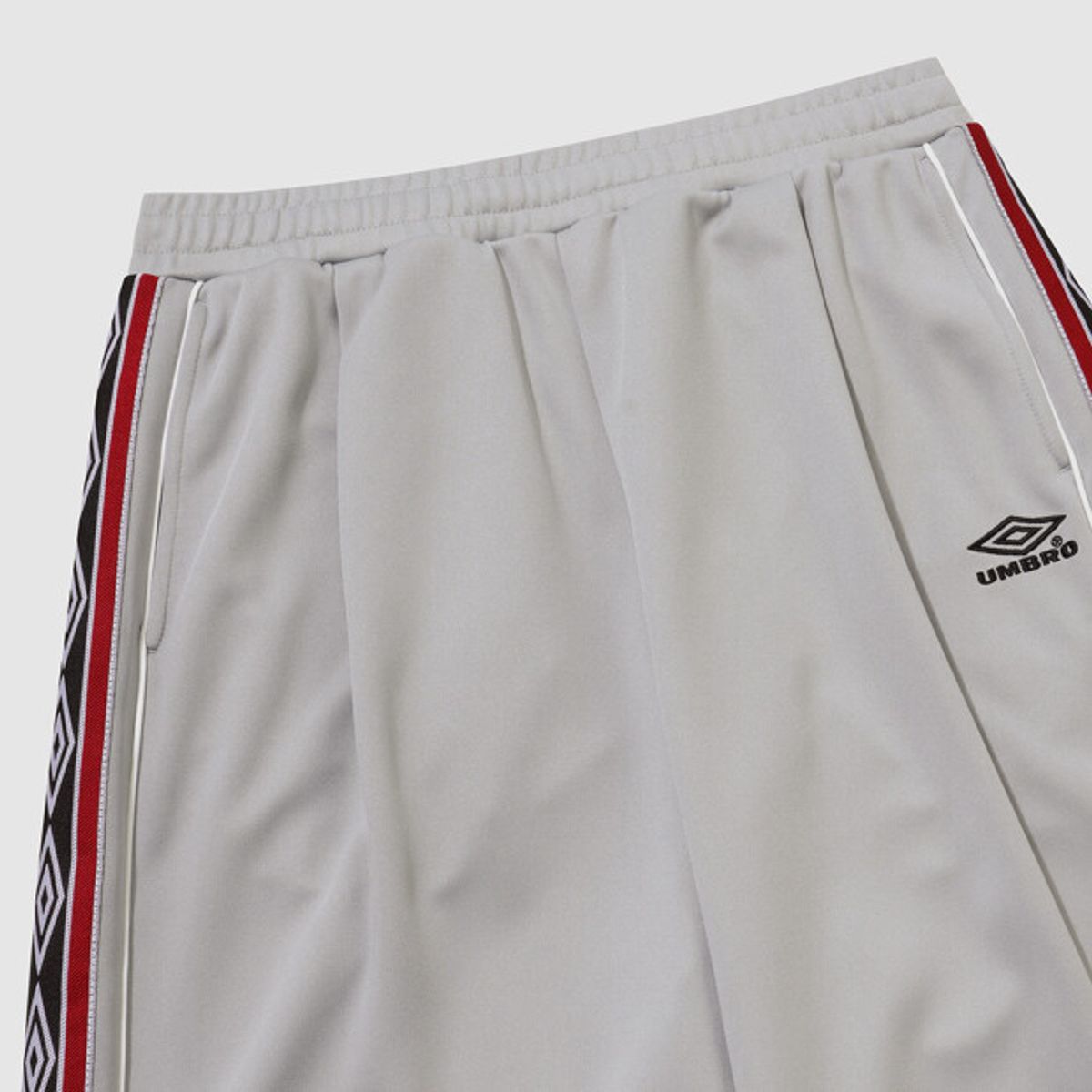 엄브로(UMBRO) 사이드 다이아 와이드 트랙 팬츠 베이지 UR123CFP15