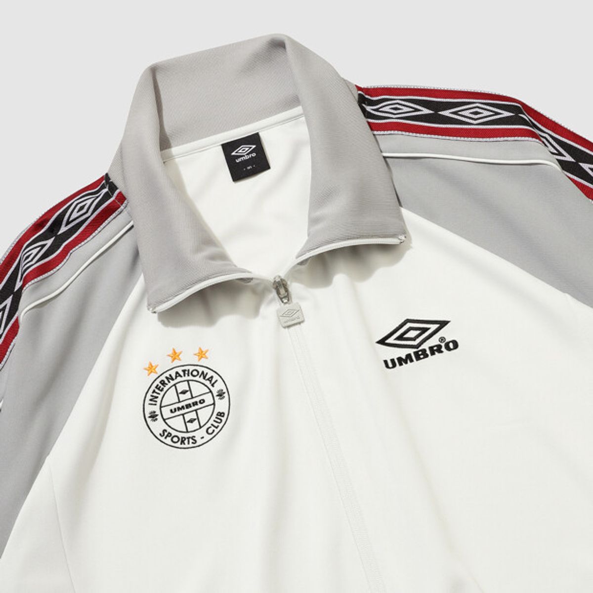 엄브로(UMBRO) 사이드 다이아 트랙 자켓 아이보리 UR124CFT14