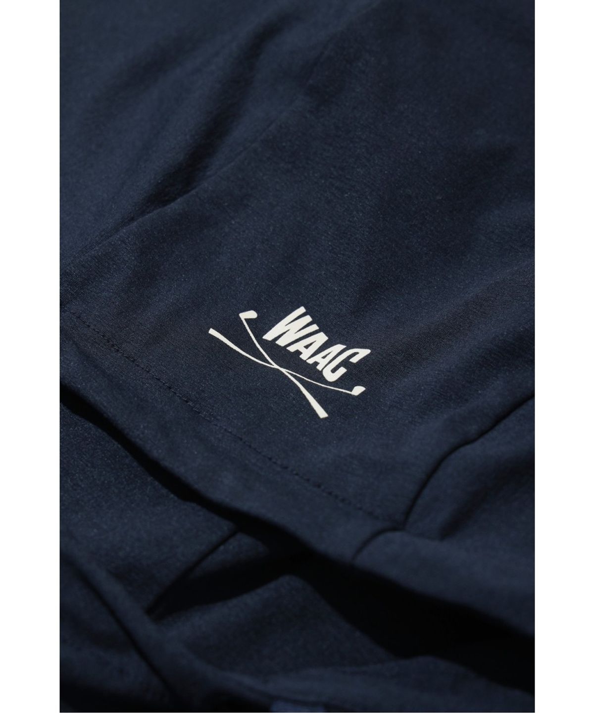 왁(WAAC) [WAAC X JONES] Men’s Lightweight Hooded Pullover WMTBS26170NYD