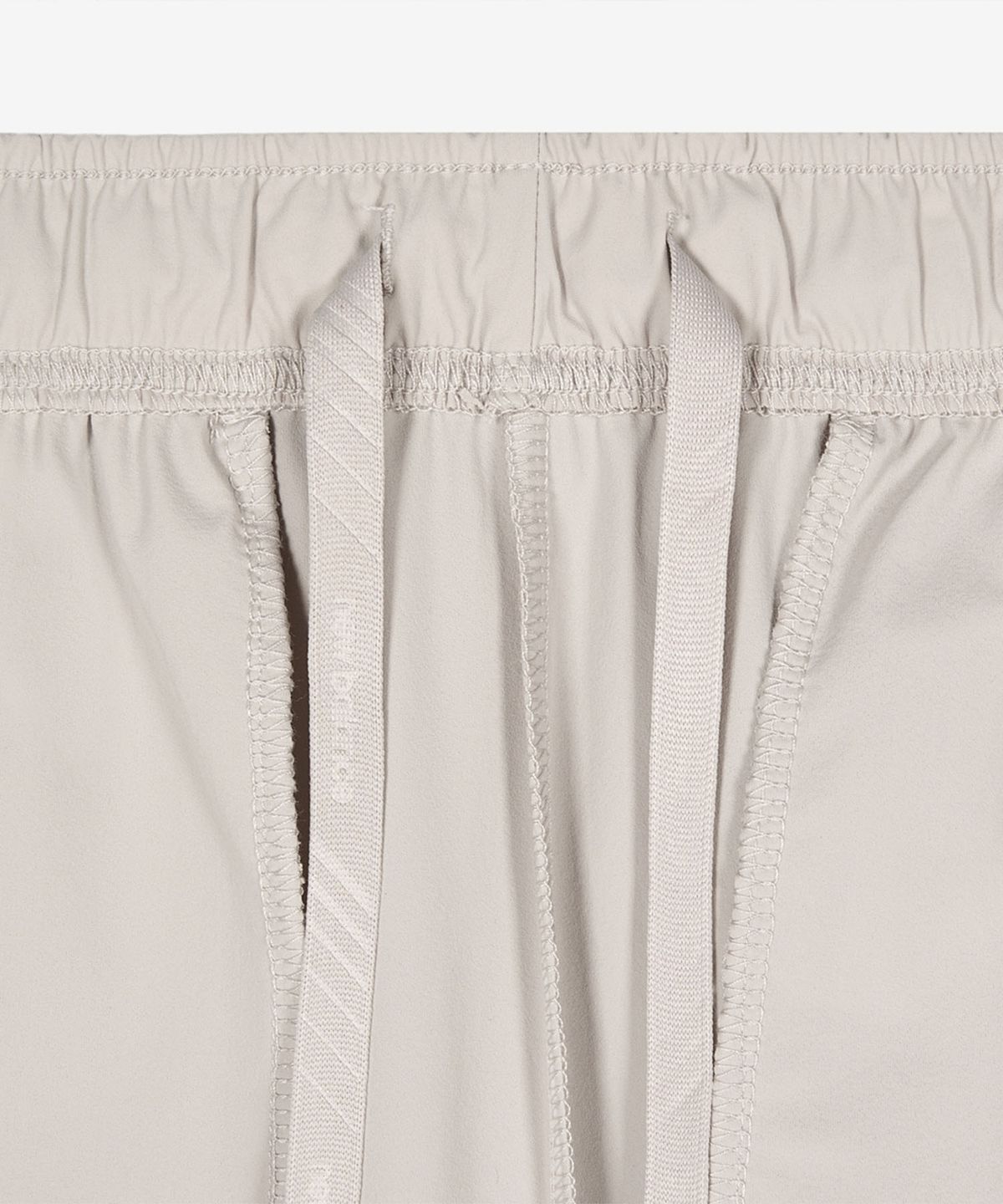 뉴발란스(NEW BALANCE) NBMLG25313 / UNI RC 트리코트 조거팬츠 (LIGHT BEIGE)