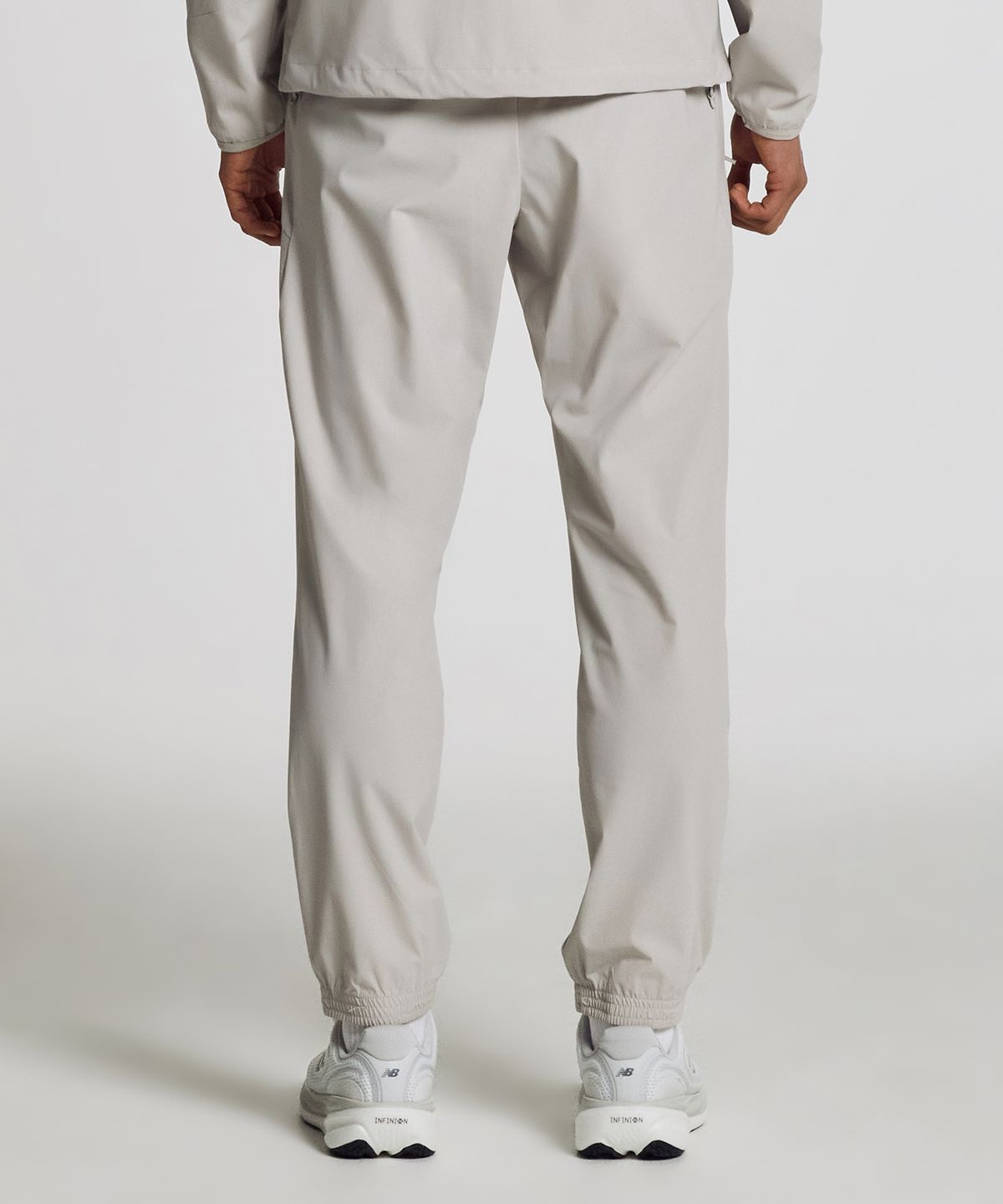 뉴발란스(NEW BALANCE) NBMLG25313 / UNI RC 트리코트 조거팬츠 (LIGHT BEIGE)