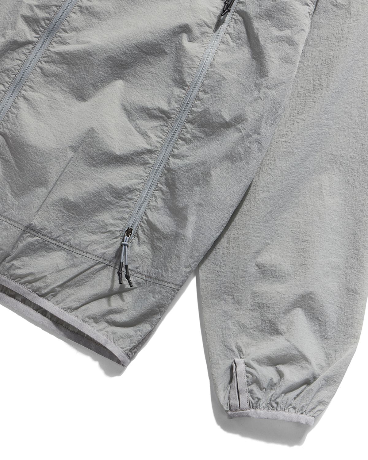 언어펙티드 에센셜(UNAFFECTED ESSENTIAL) LS COMFORT WINDBREAKER / L.GREY