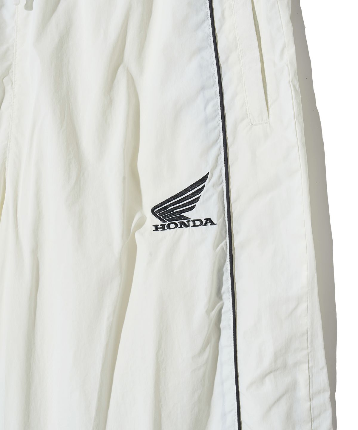 핍스 모터사이클(PHYPS MOTORCYCLE) Basic Logo nylon Track Pants Ivory