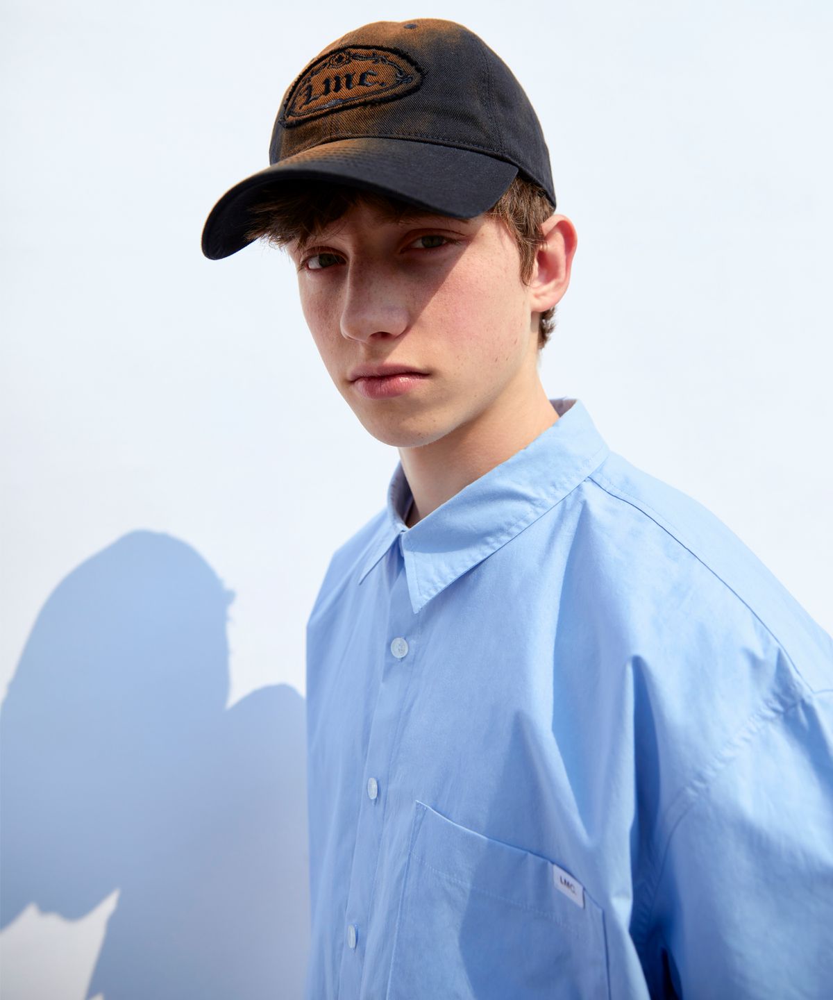 엘엠씨(LMC) WASHED DENIM GOTHIC OVAL 6PANEL CAP blue