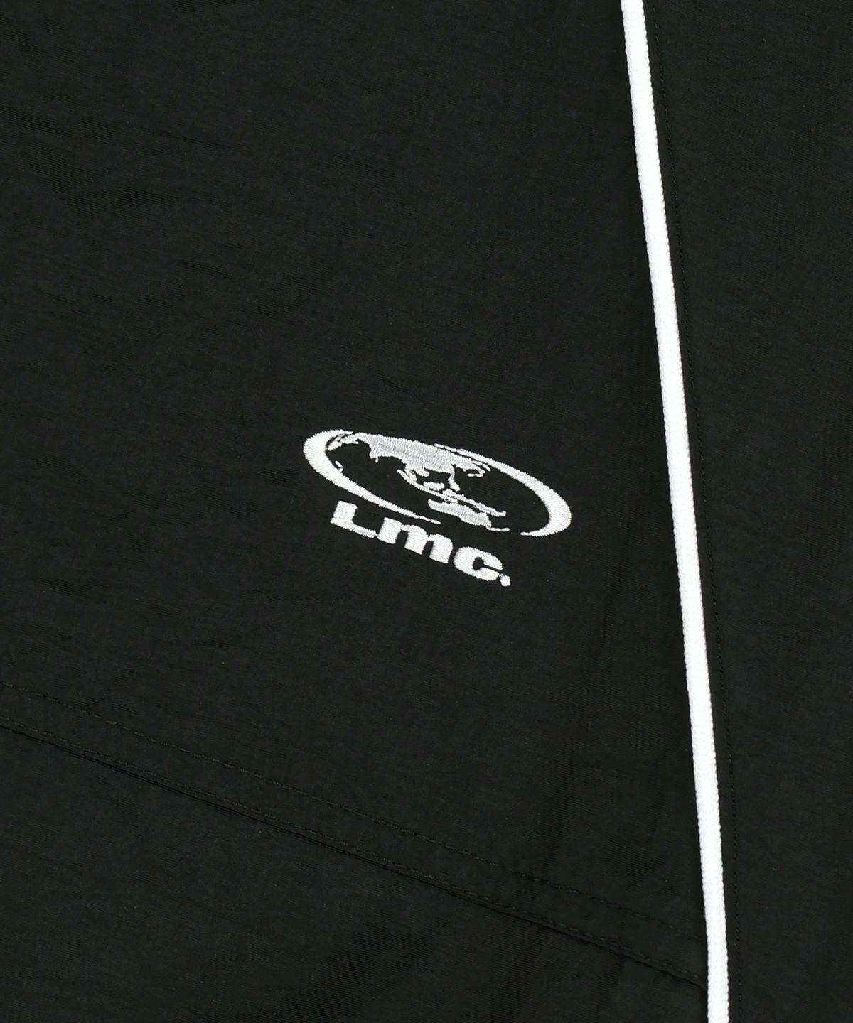 엘엠씨(LMC) PIPING TRACK JACKET black