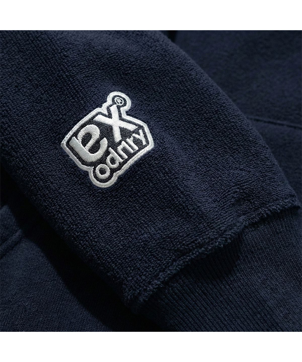 엑스트라오디너리(EXTRAORDINARY) REVERSIBLE EX LOGO HOODIE NAVY