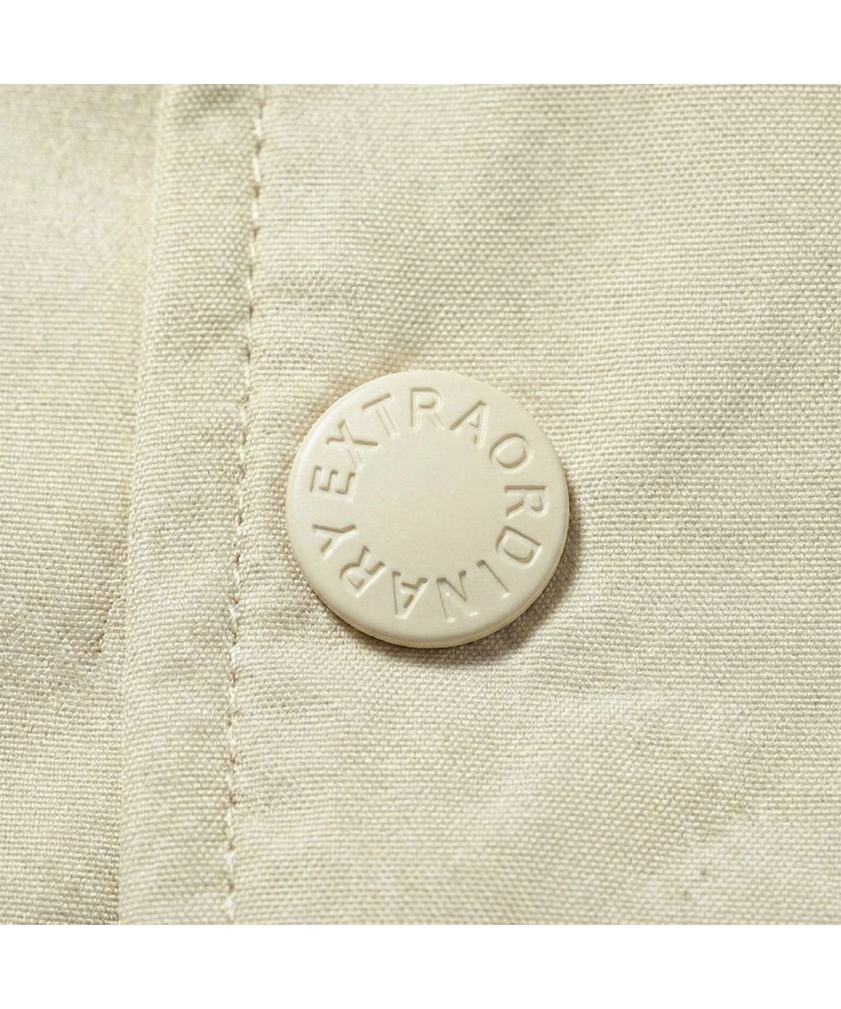 엑스트라오디너리(EXTRAORDINARY) STUDIO LOGO COACH JACKET IVORY