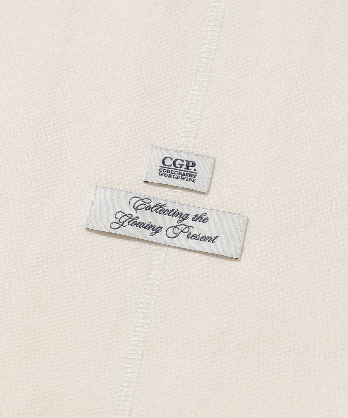 코드그라피(CGP) (우먼) 레글런 스트라이프 배색 롱슬리브-크림