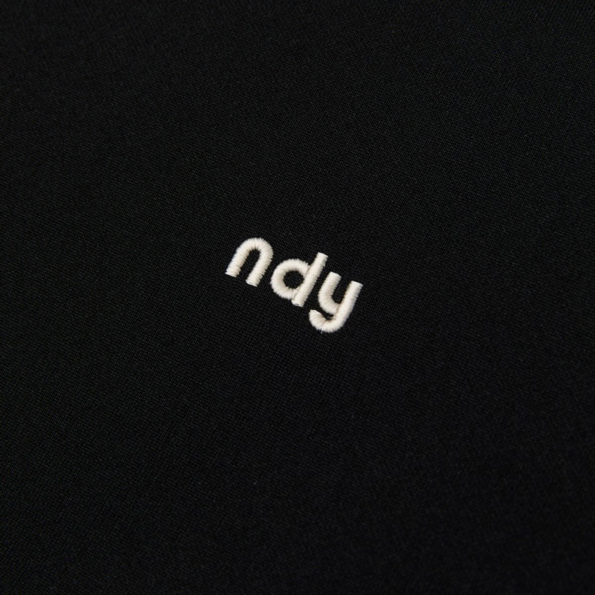 엔디와이(NDY) 루즈 핏 클래식 NY 트랙 탑 블랙