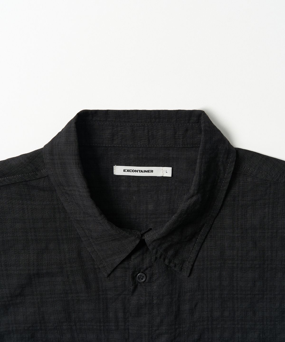 엑스컨테이너(EXCONTAINER) [여름용] 뮤티드 체크 세미 크롭 셔츠 (BLACK)