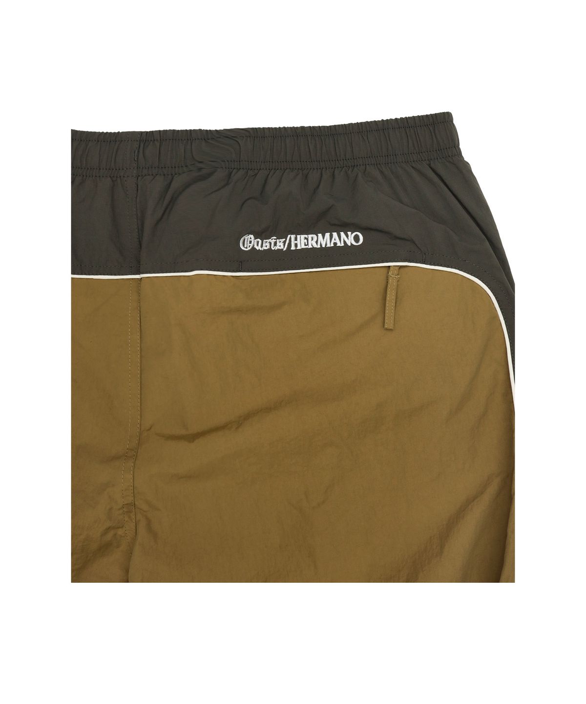 애프터매스(AFTERMATH) ATM PIPING TRACK PANTS KHAKI