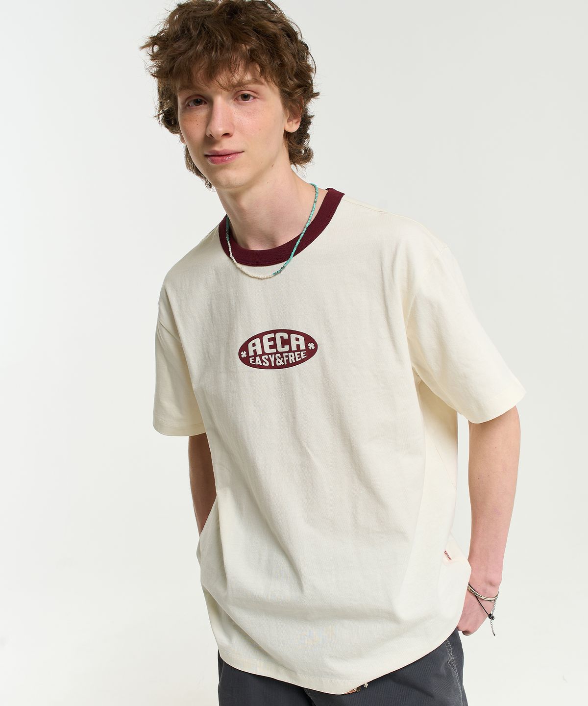 에이카화이트(AECA) AECA OVAL EMBLEM GRAPHIC RINGER HALF SLEEVE TEE-IVORY