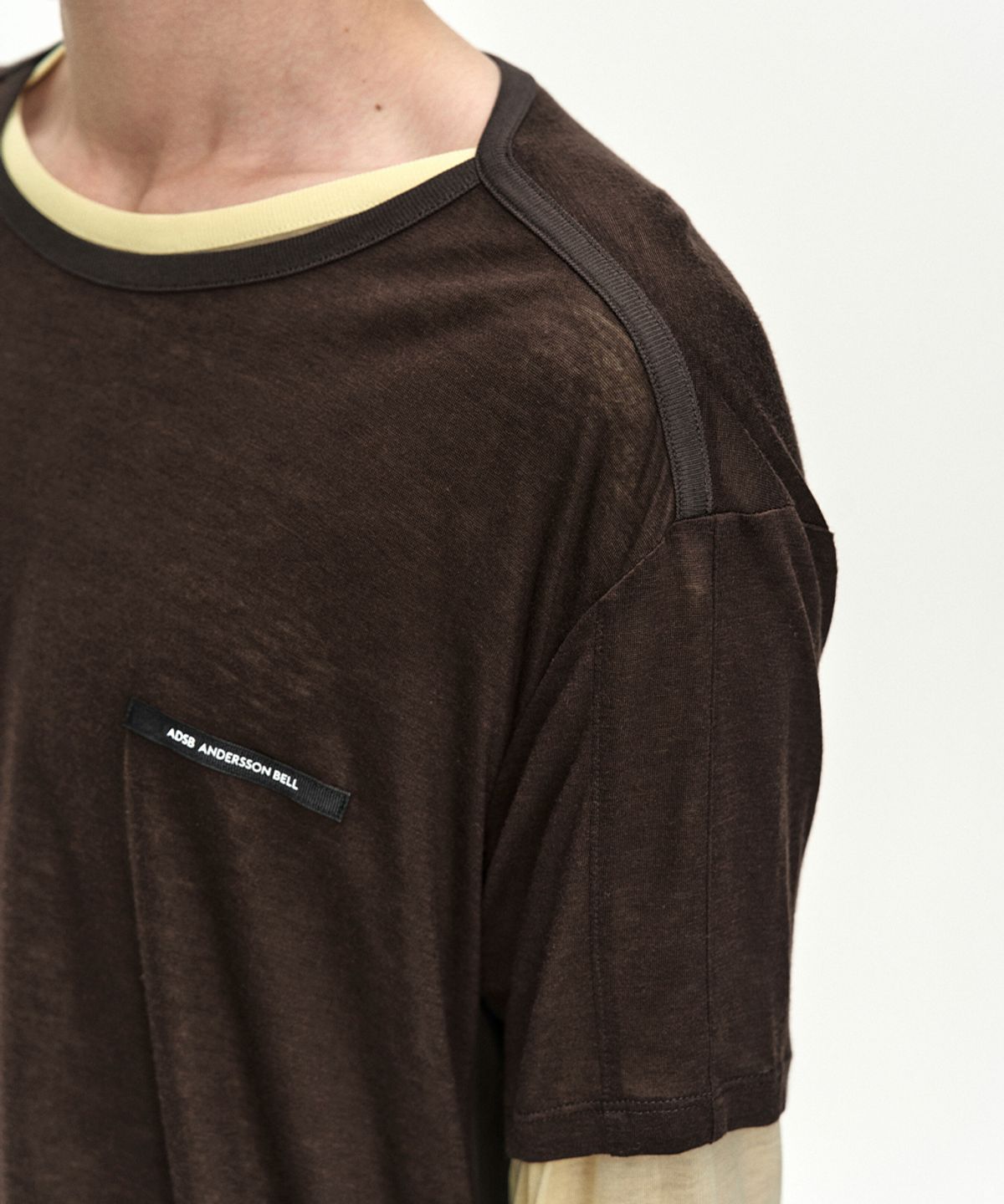 앤더슨벨(ADSB ANDERSSON BELL) BRAD LAYERED T-SHIRT atb1531m(LEMON/BROWN)