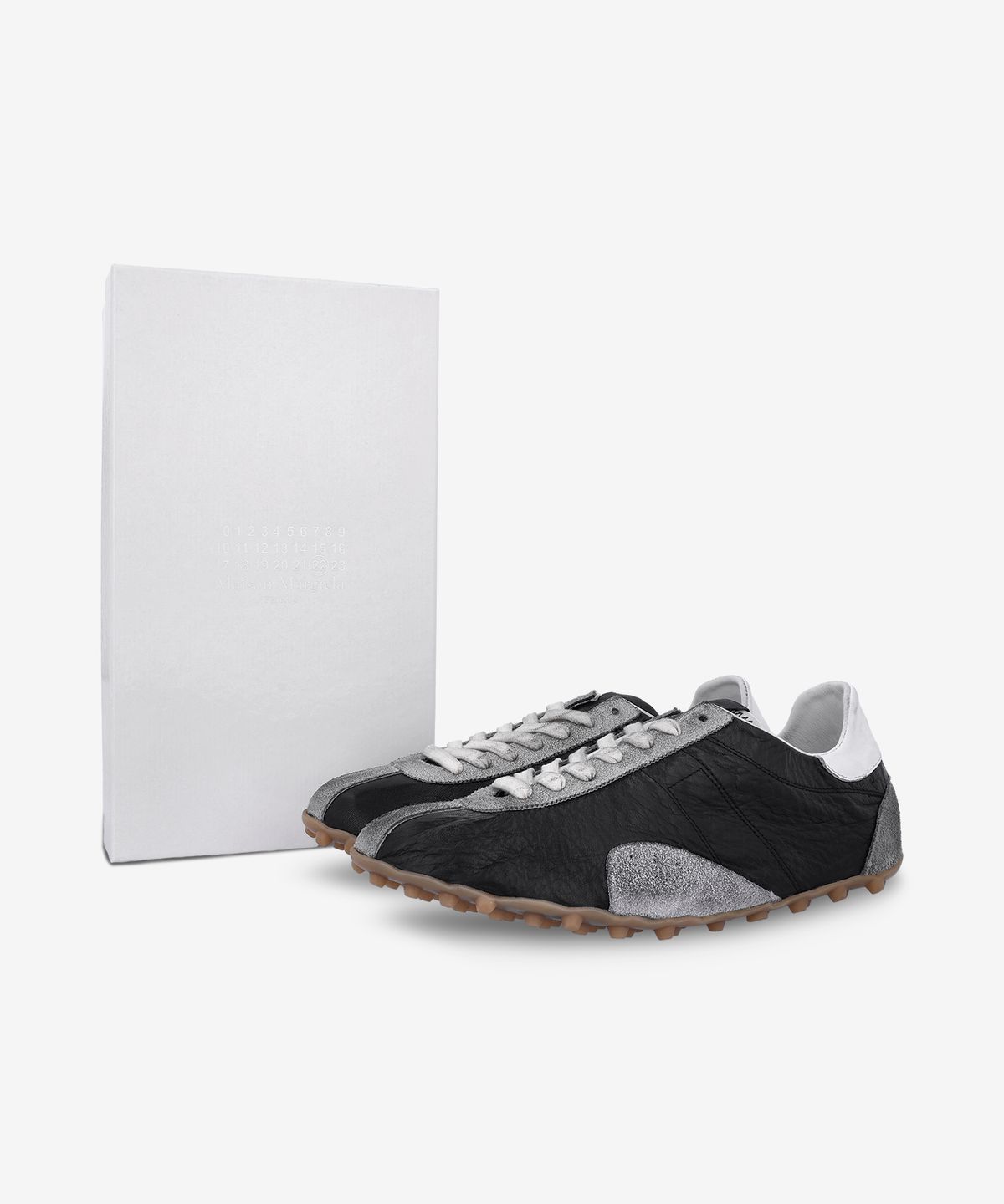 메종 마르지엘라(MAISON MARGIELA) 스프린터 로우 탑 스니커즈 - 블랙:화이트 / S57WS0515P7383HA316