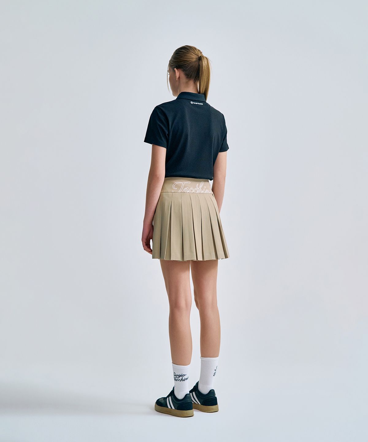 세르지오 타키니(SERGIO TACCHINI) W 타키니 플라잉 백플리츠 스커트 (D.Beige)