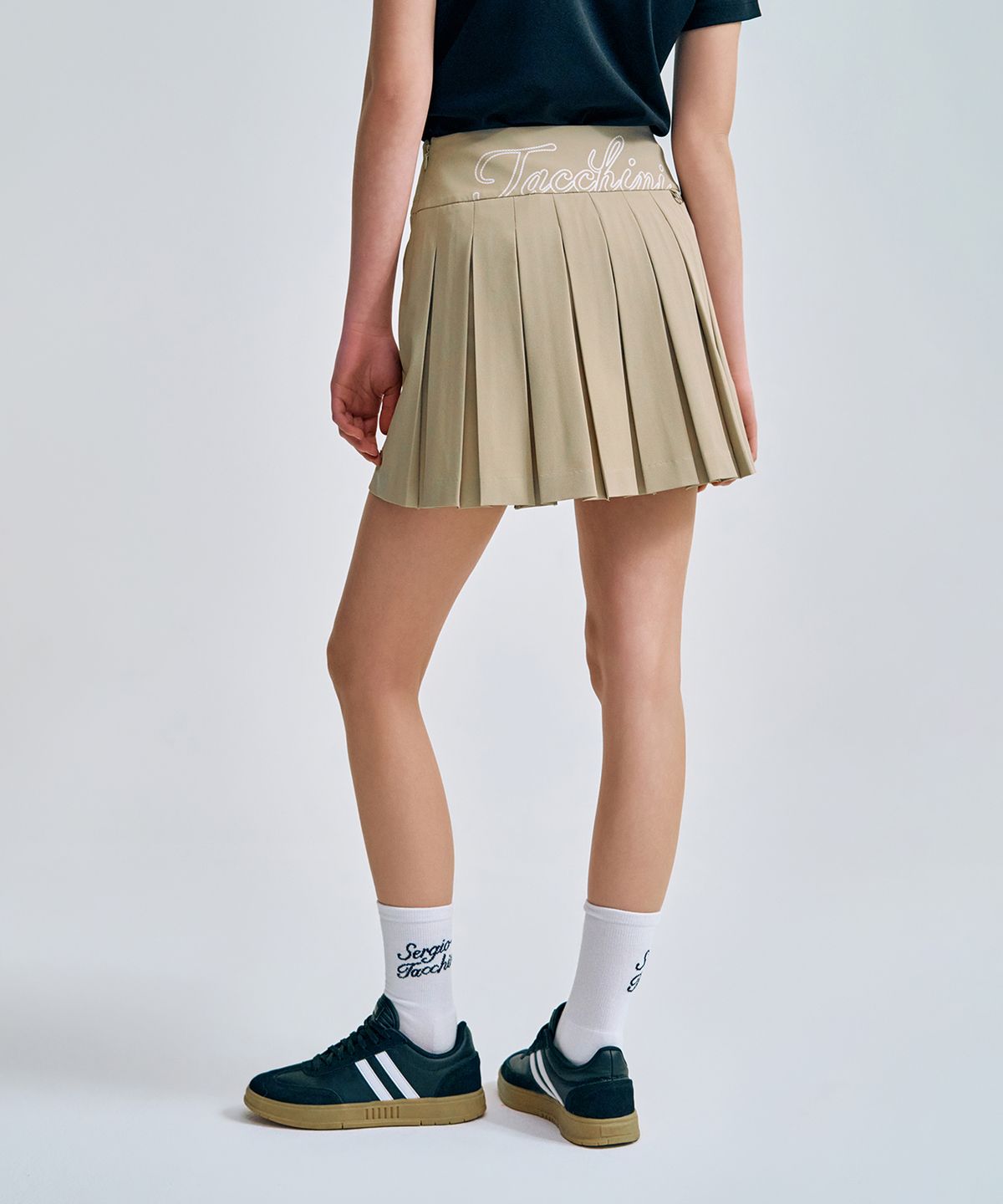 세르지오 타키니(SERGIO TACCHINI) W 타키니 플라잉 백플리츠 스커트 (D.Beige)