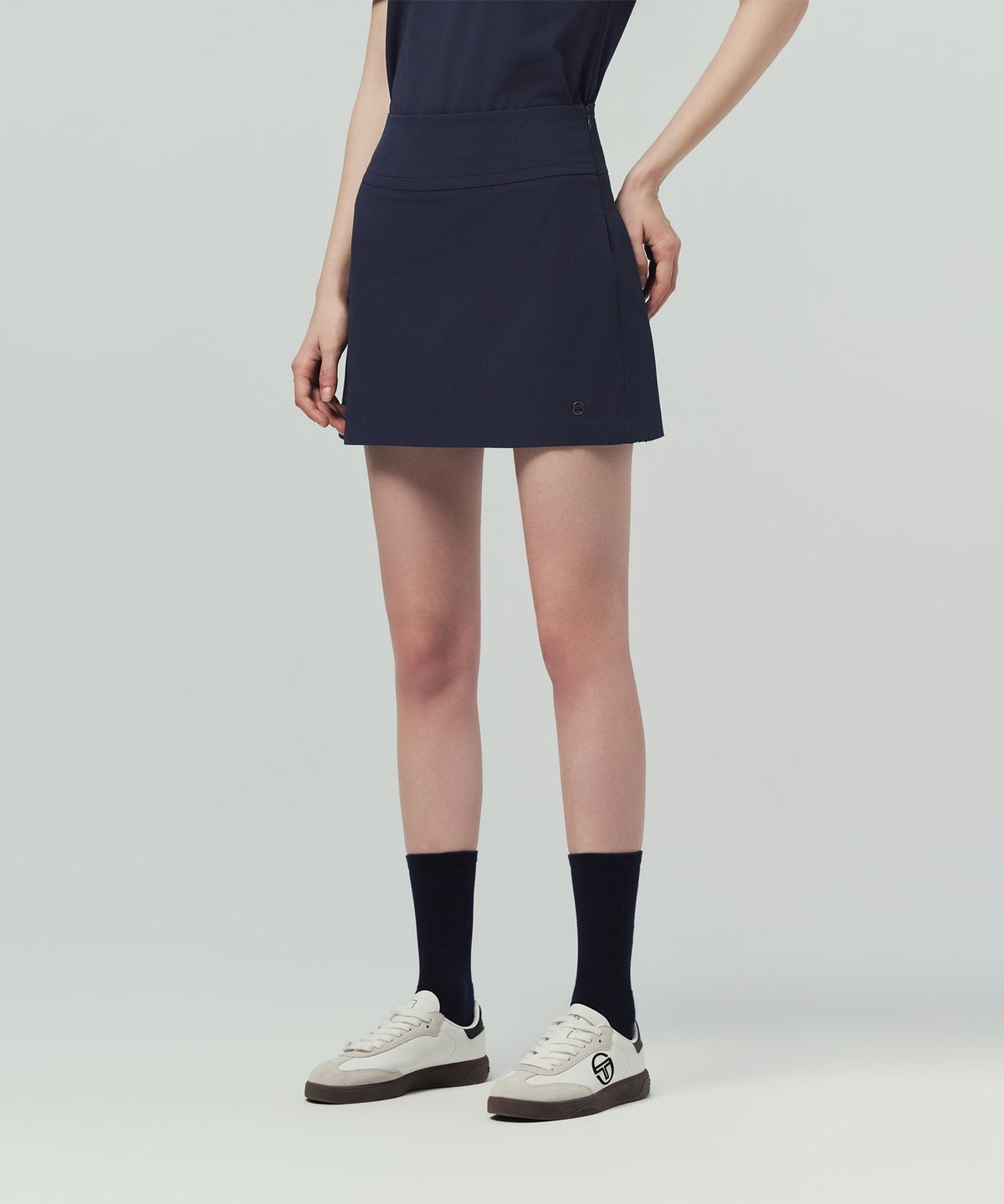 세르지오 타키니(SERGIO TACCHINI) W 타키니 플라잉 백플리츠 스커트 (Navy)