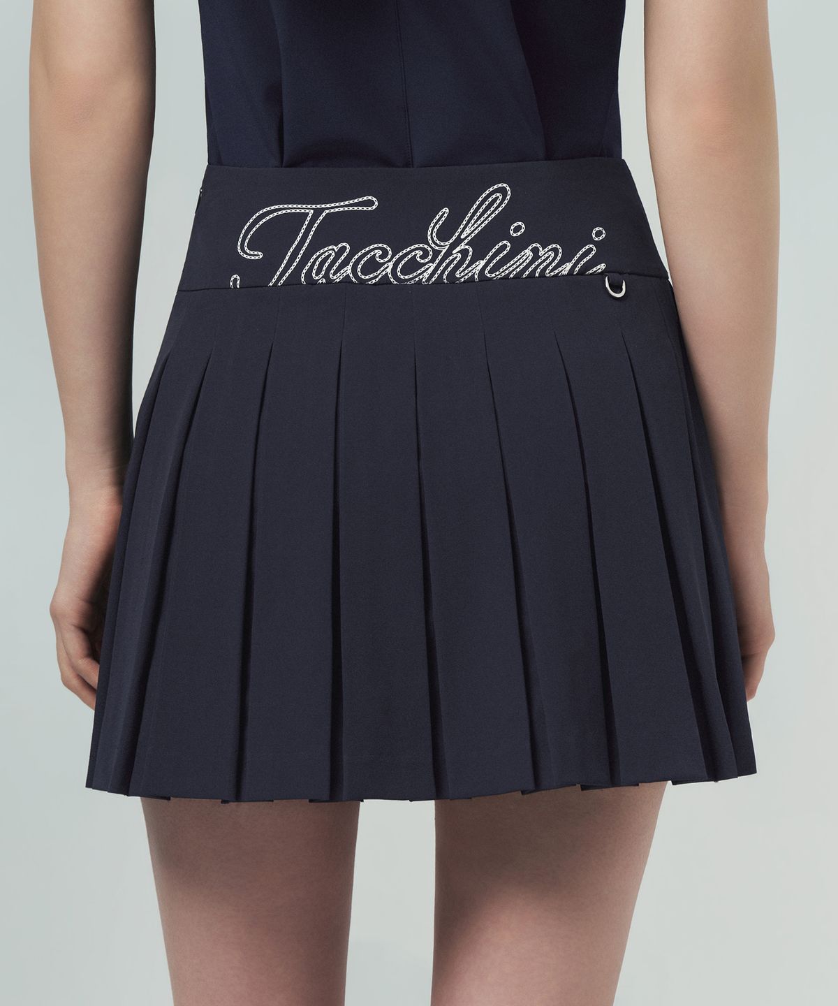 세르지오 타키니(SERGIO TACCHINI) W 타키니 플라잉 백플리츠 스커트 (Navy)
