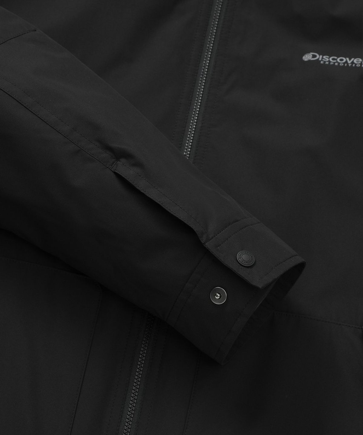 디스커버리 익스페디션(DISCOVERY EXPEDITION) 남성 베르텍스 2L 경량 마운틴쿡 자켓 (BLACK)