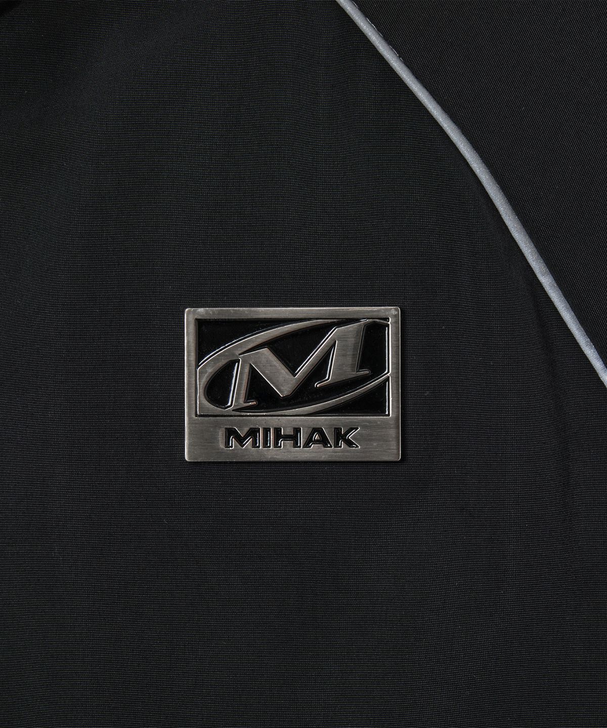 미학(MIHAK) 메탈 플레이트 파이핑 크롭 웜업 자켓 (BLACK)