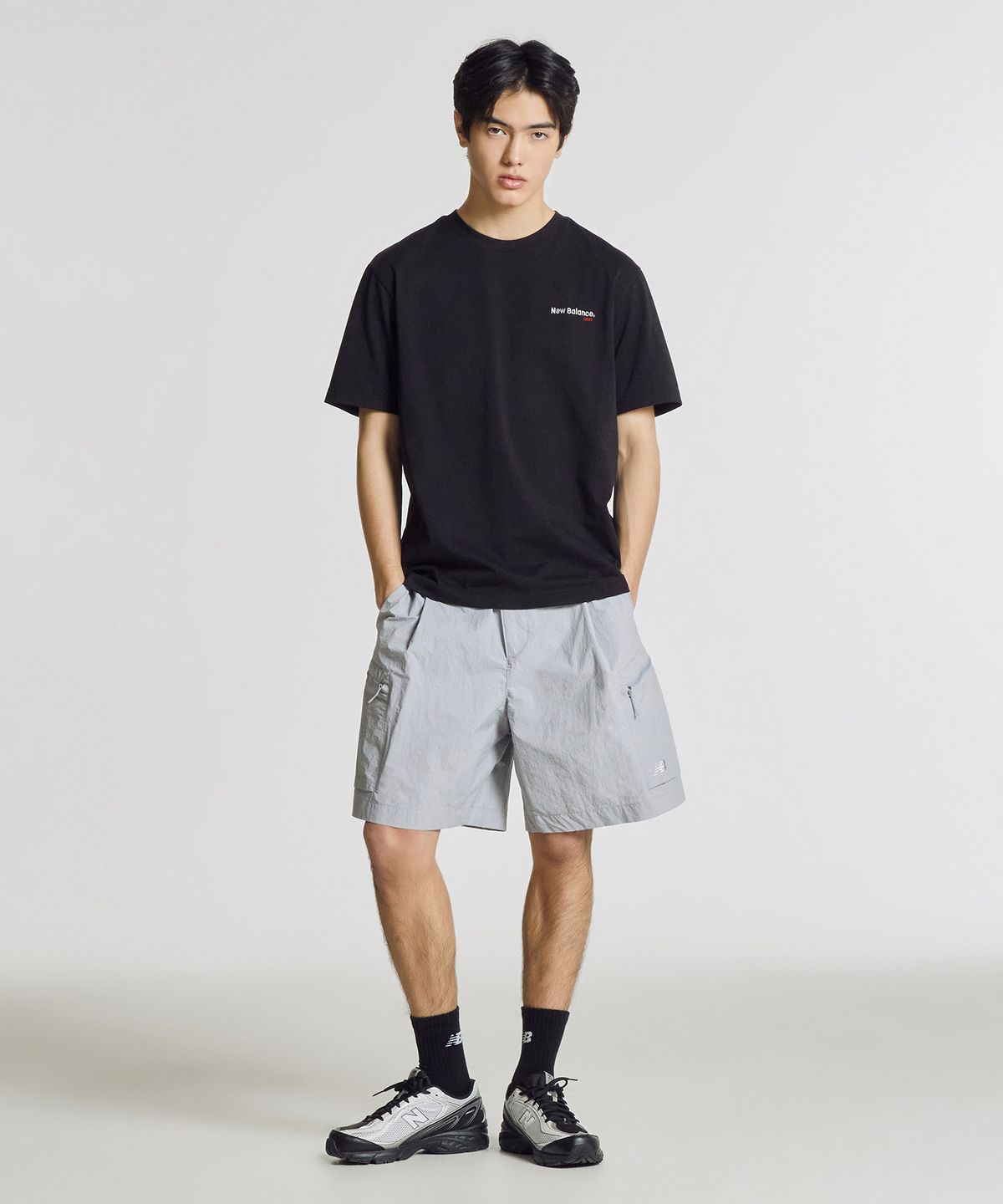 뉴발란스(NEW BALANCE) NBNEG21433 / UNI 에센셜 빅로고 반팔티 (BLACK)