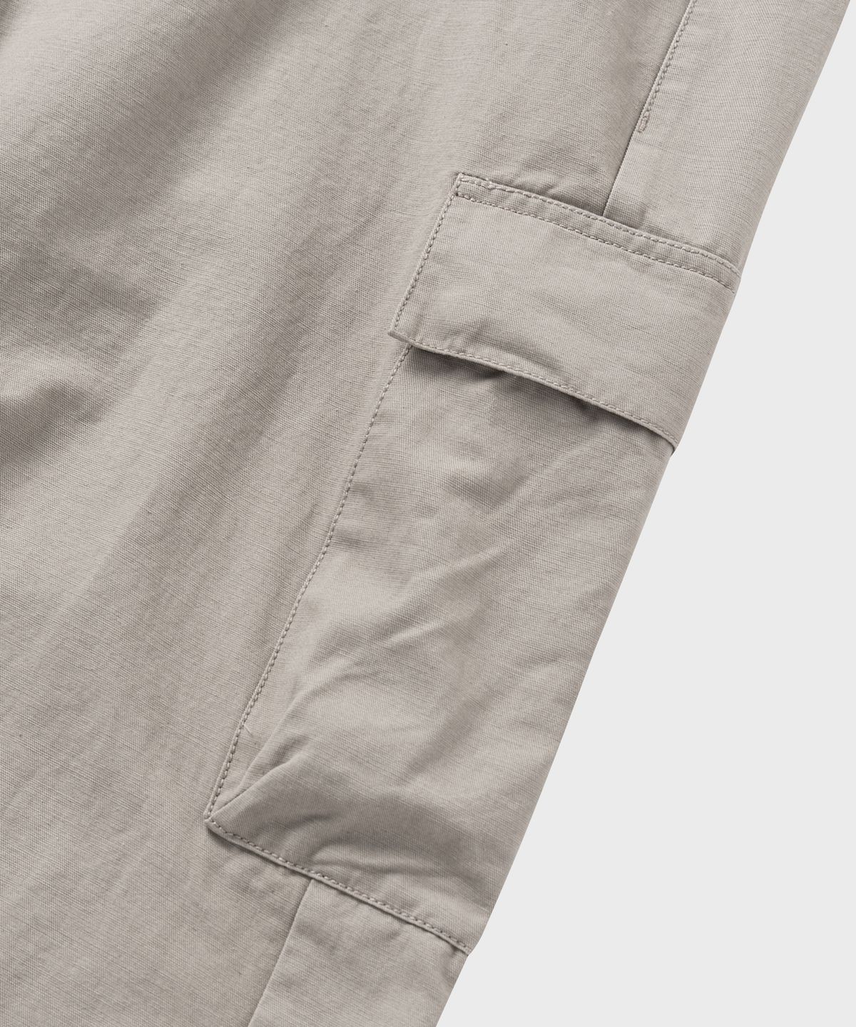 넌블랭크(NONBLANK) 워시드 와이드 커브드 카고 팬츠_BEIGE
