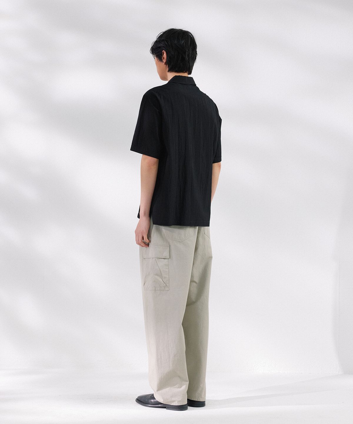 넌블랭크(NONBLANK) 워시드 와이드 커브드 카고 팬츠_BEIGE