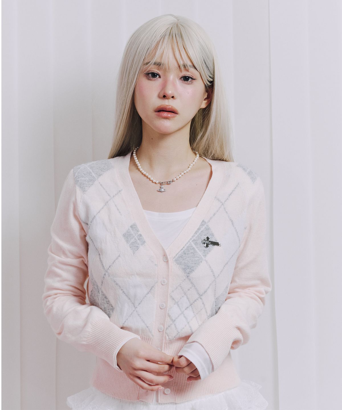 일리오(ILLIO) Pink argyle cardigan