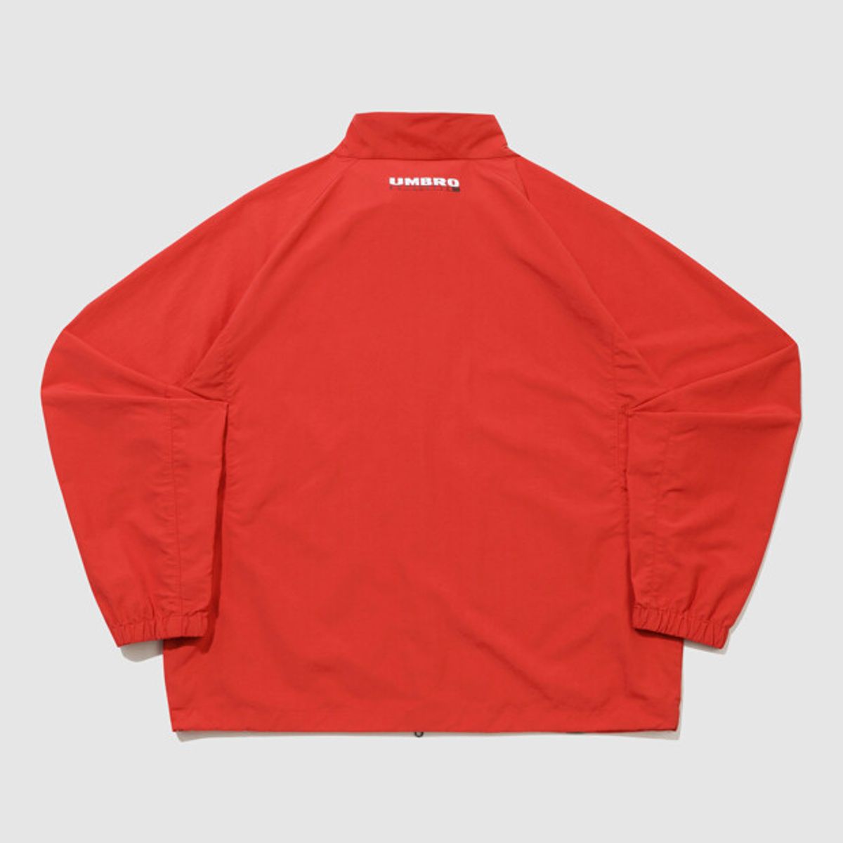 엄브로(UMBRO) 클래식 스탠넥 웜업 바람막이 자켓 레드 UR121CJK31