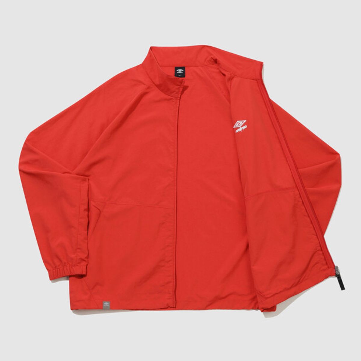 엄브로(UMBRO) 클래식 스탠넥 웜업 바람막이 자켓 레드 UR121CJK31
