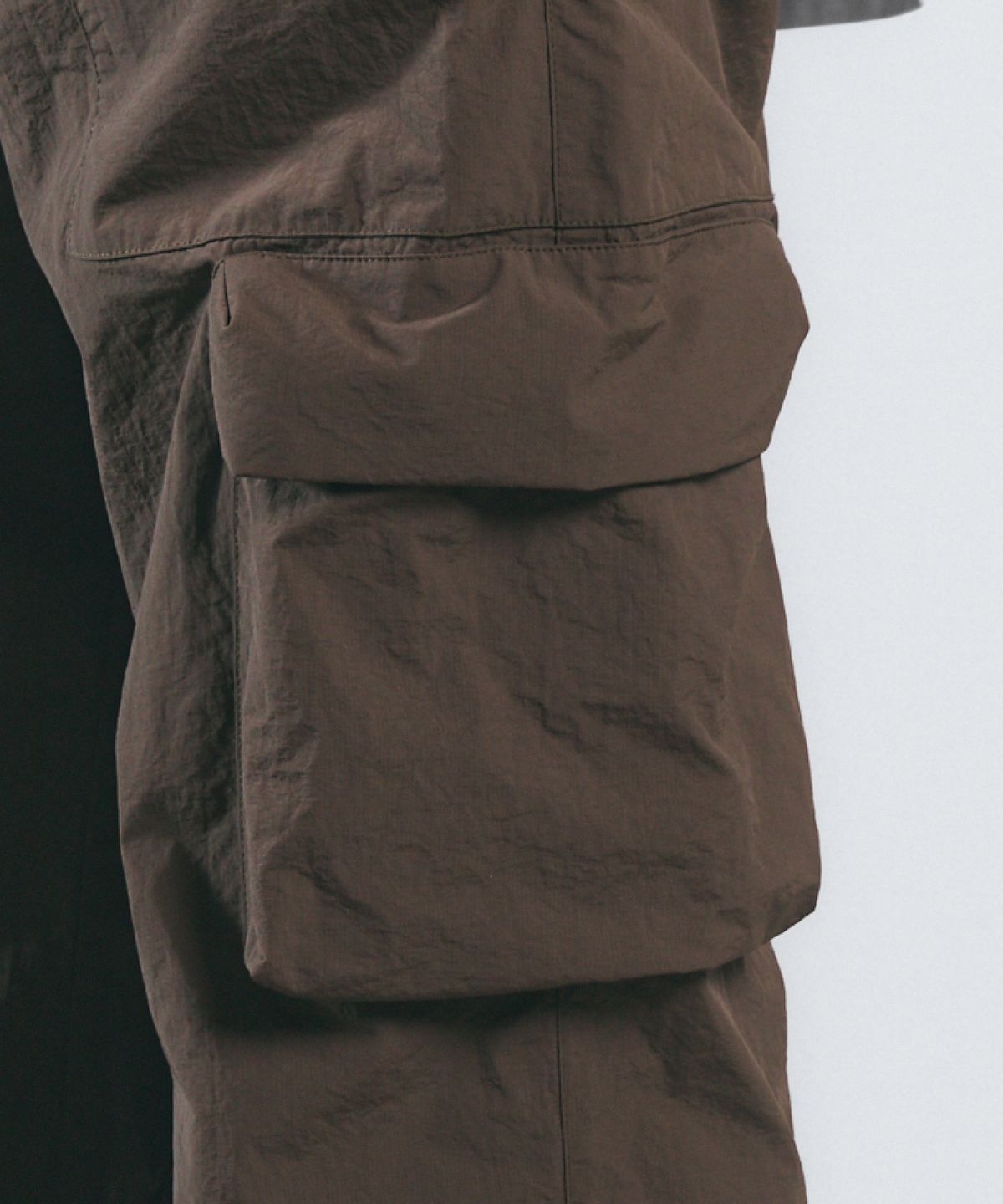 칼라파타르(KALAPATTHAR) UTILITY NYLON RIPSTOP SEMI-WIDE PANTS - BROWN