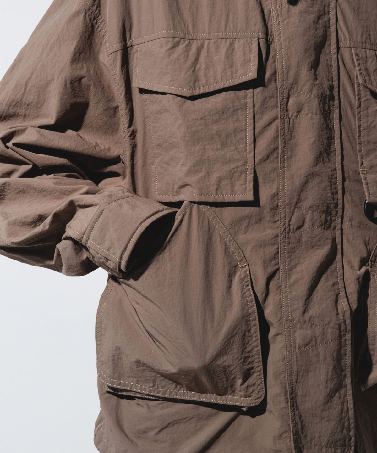 칼라파타르(KALAPATTHAR) LIGHTWEIGHT NYLON RIPSTOP UTILITY HOODED SHELL JACKET - BEIGE