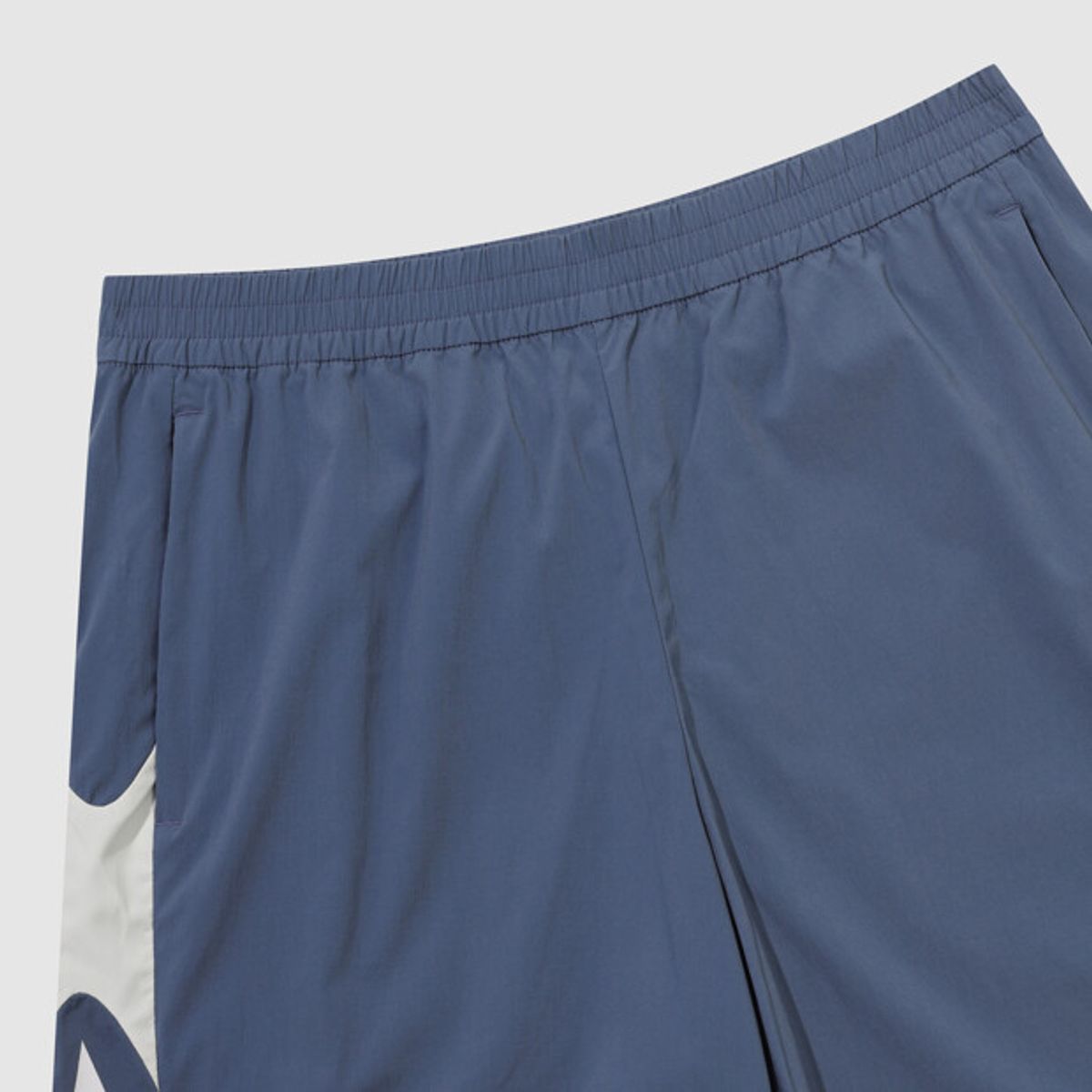 엄브로(UMBRO) PTR 우븐 워밍업 4.5부 반바지 블루 UR121SHP39
