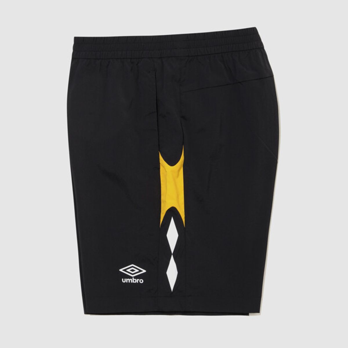 엄브로(UMBRO) PTR 우븐 워밍업 4.5부 반바지 블랙 UR121SHP39