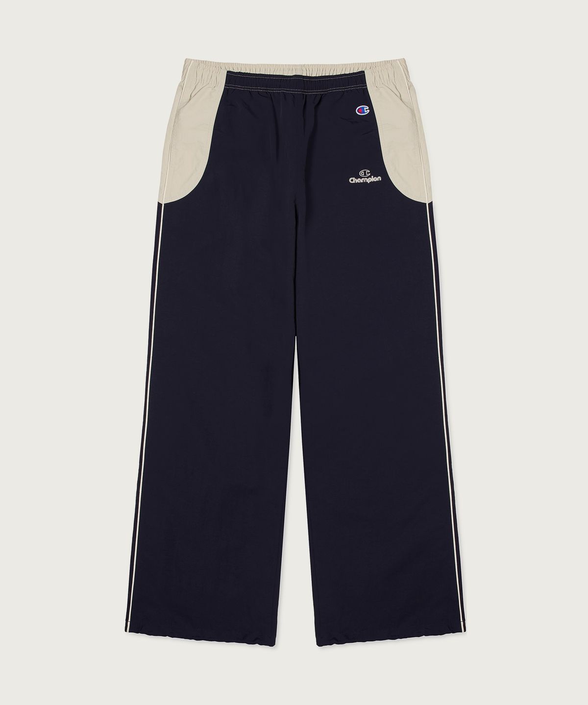 챔피온(CHAMPION) 트랙 로고 컬러블록 트랙 팬츠 Navy