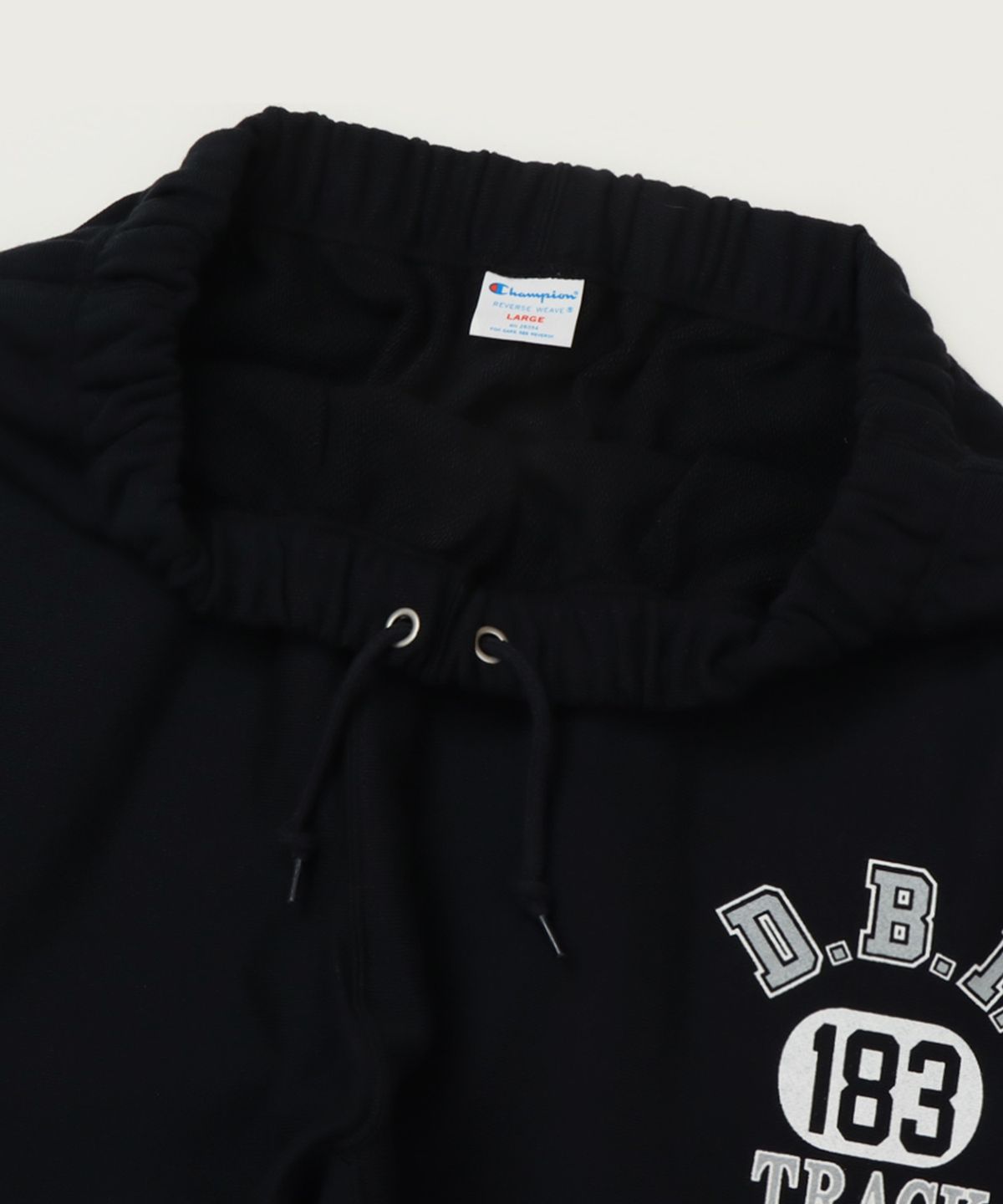 챔피온(CHAMPION) 리버스위브 레귤러핏 그래픽 스웨트팬츠 Black