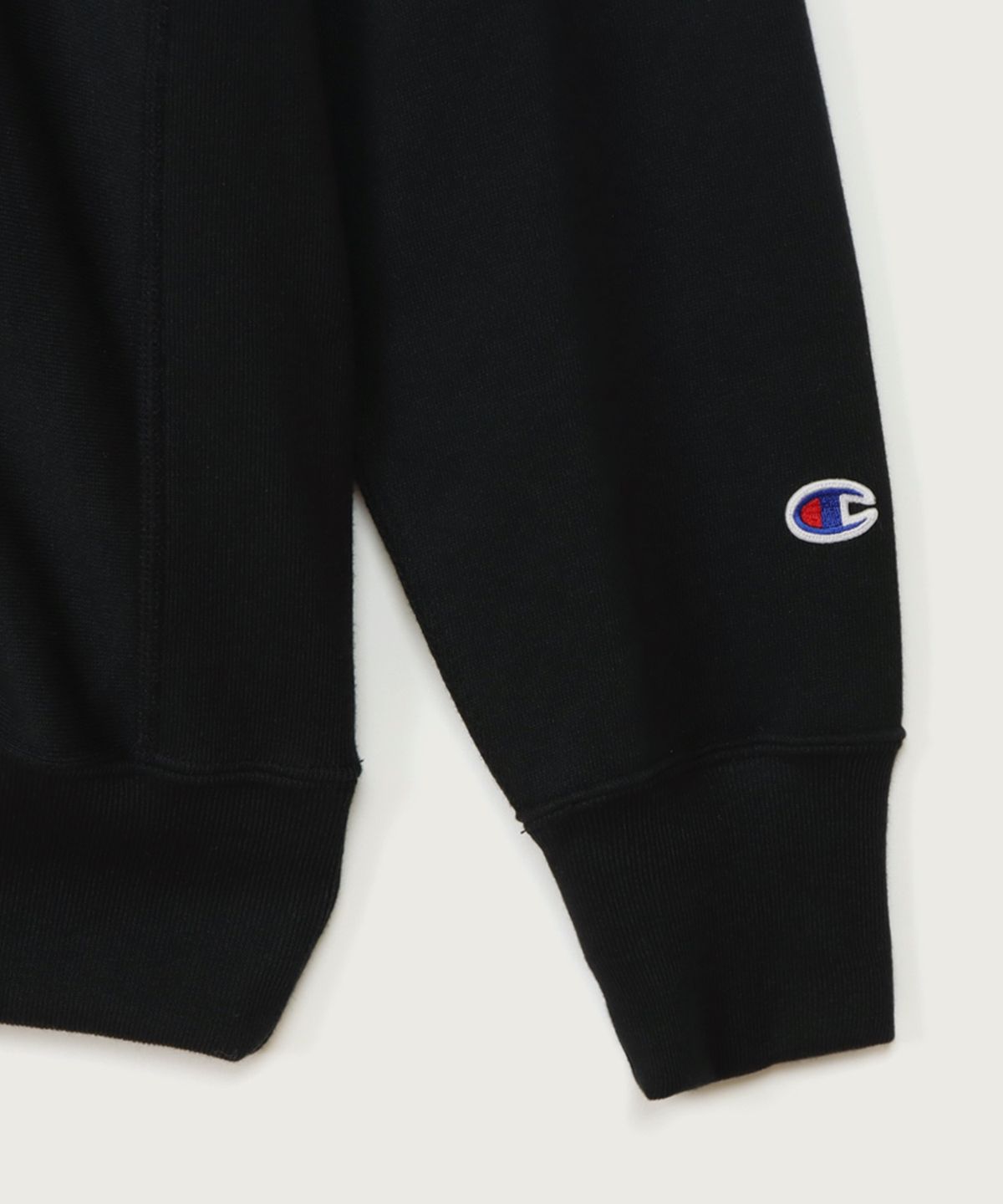 챔피온(CHAMPION) 리버스위브 루즈핏 그래픽 후드 티셔츠 Black