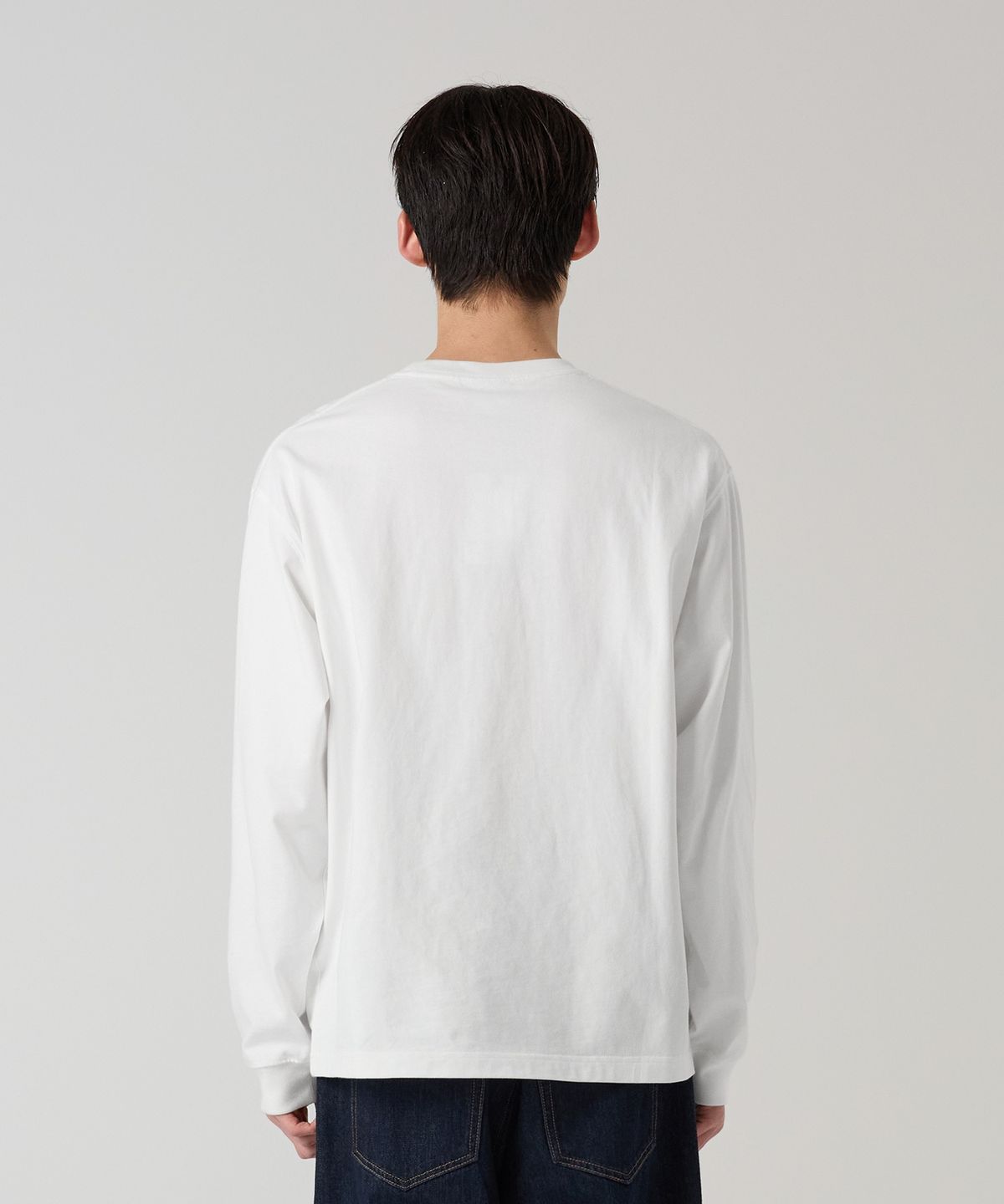 챔피온(CHAMPION) 트랙 로고 루즈핏 조그택 롱슬리브 티셔츠 White
