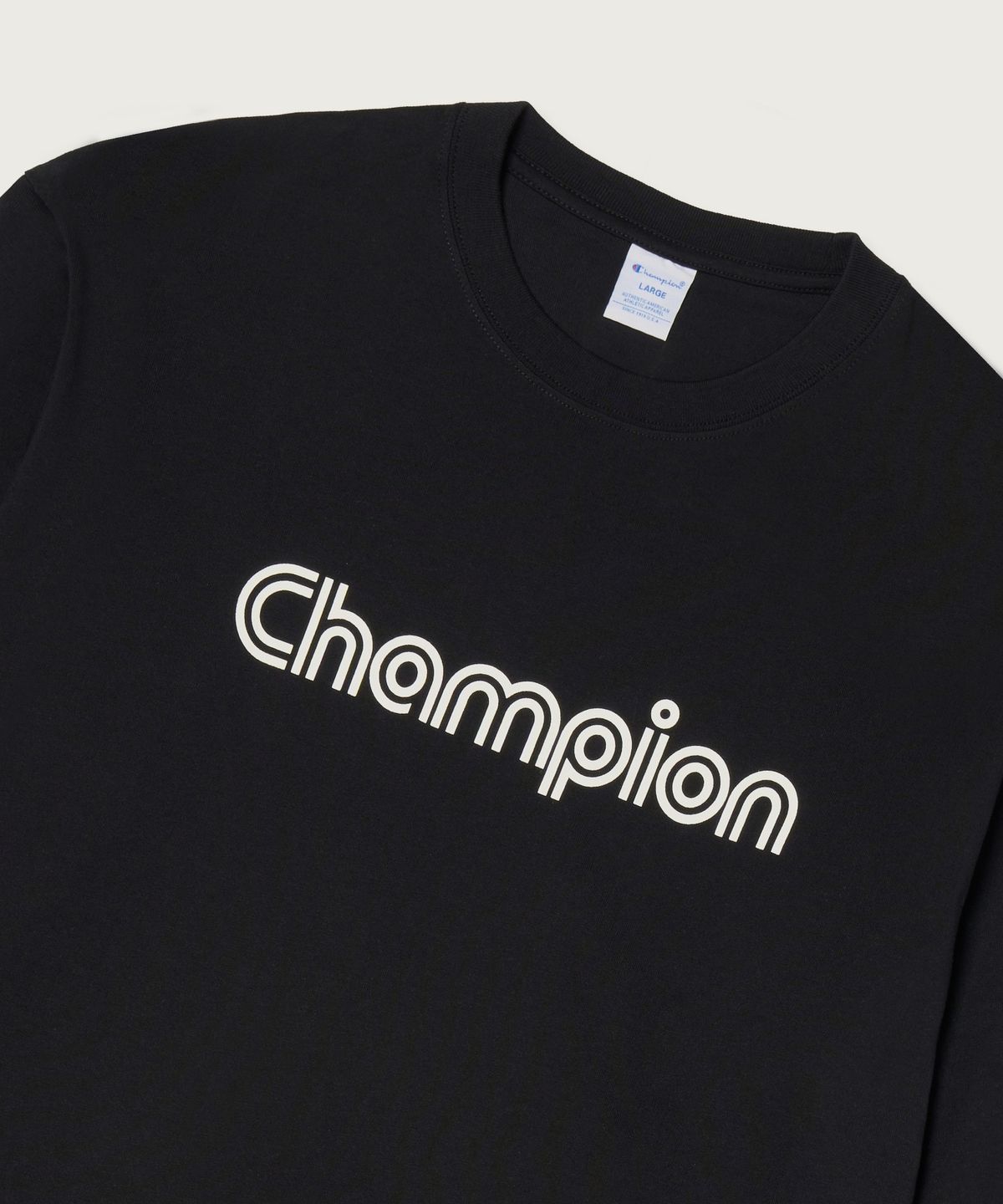 챔피온(CHAMPION) 트랙 로고 루즈핏 조그택 롱슬리브 티셔츠 Black