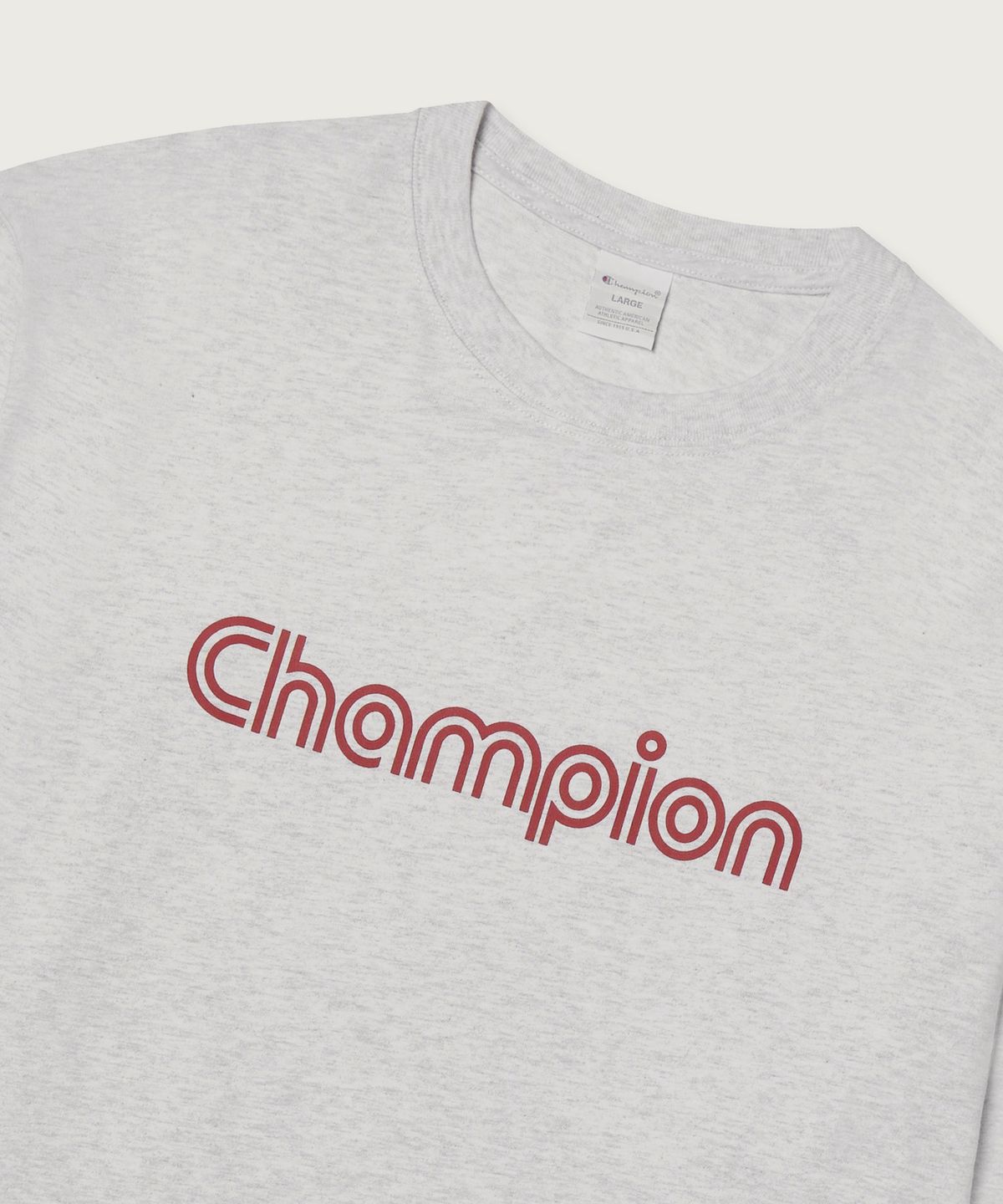 챔피온(CHAMPION) 트랙 로고 루즈핏 조그택 롱슬리브 티셔츠 Light Grey