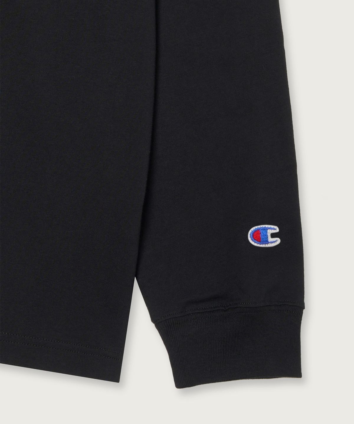 챔피온(CHAMPION) 아치 로고 루즈핏 롱슬리브 티셔츠 Black