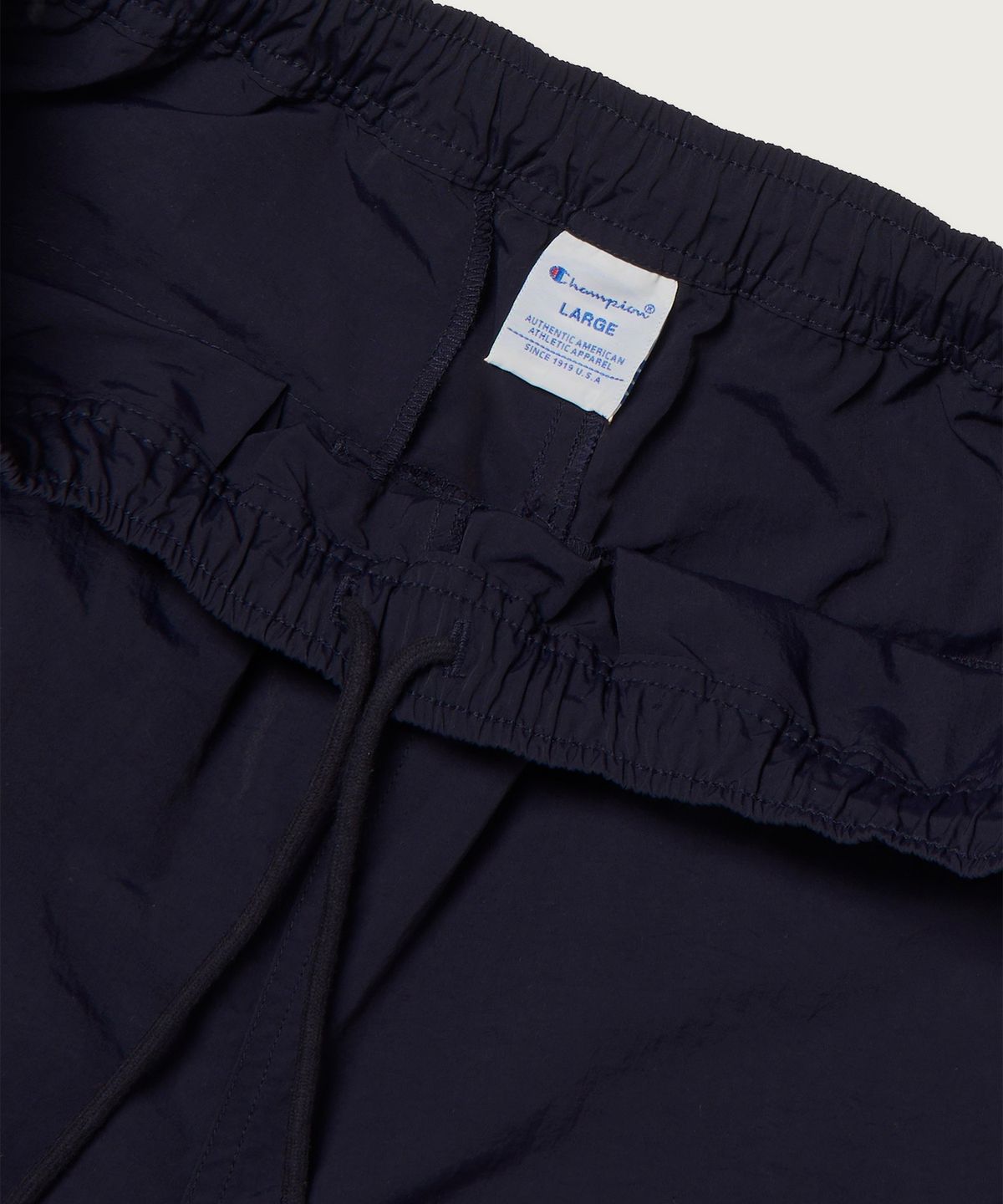 챔피온(CHAMPION) 트랙 로고 프로 쇼츠 Navy