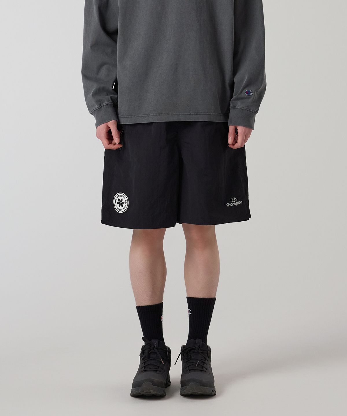 챔피온(CHAMPION) 트랙 로고 프로 쇼츠 Black