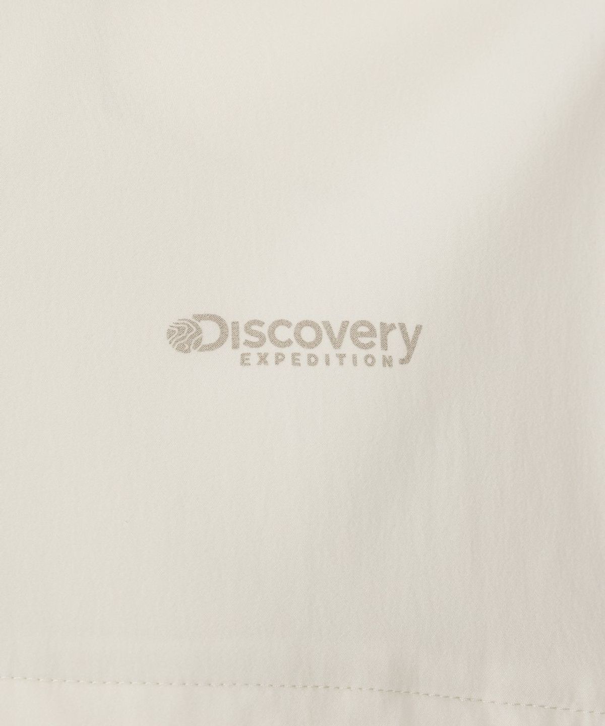 디스커버리 익스페디션(DISCOVERY EXPEDITION) 여성 프레시벤트 경량 우븐 트레이닝 후드 아노락 (D/IVORY)