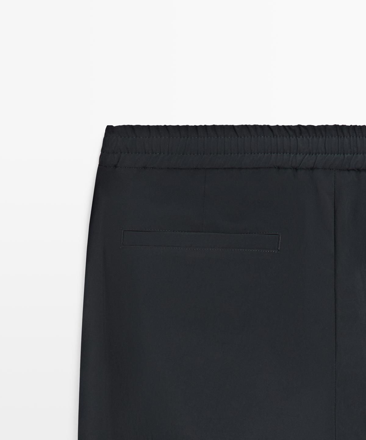 마시모두띠(MASSIMO DUTTI) 하이테크 토탈룩 팬츠
