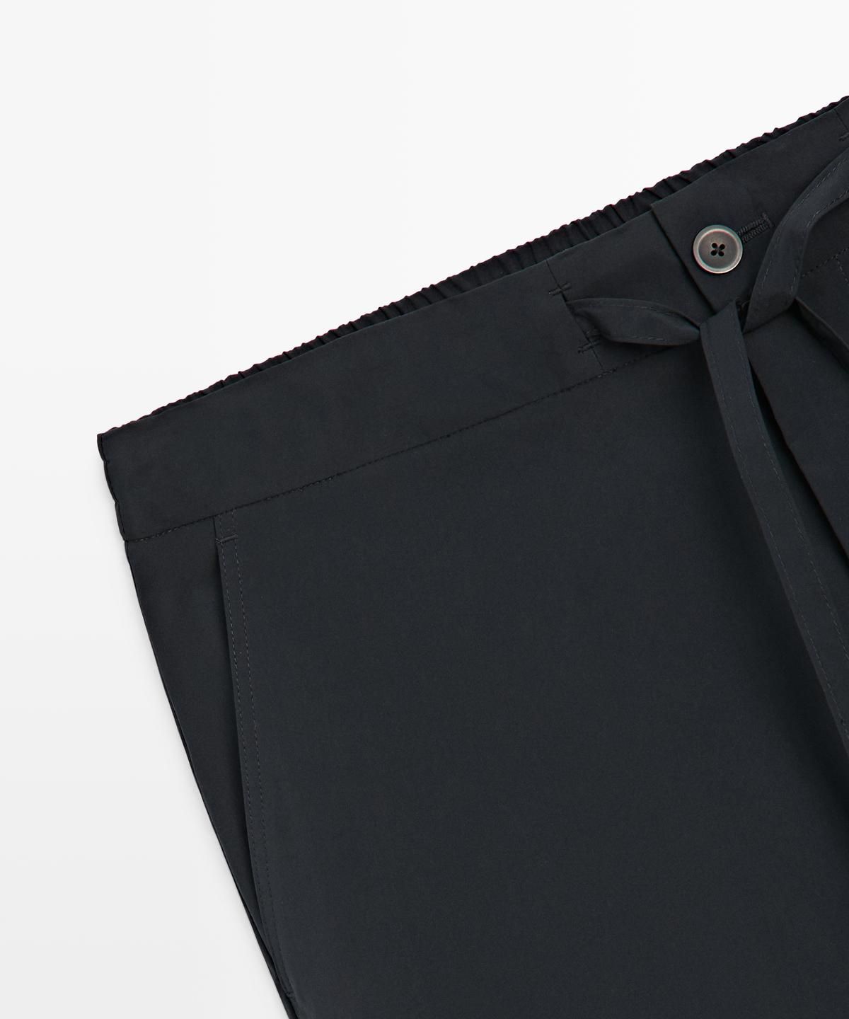 마시모두띠(MASSIMO DUTTI) 하이테크 토탈룩 팬츠