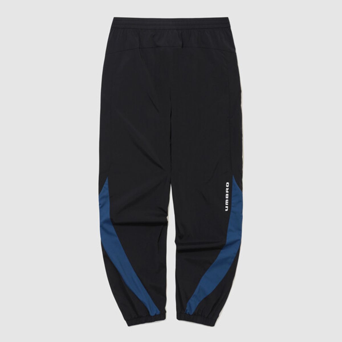 엄브로(UMBRO) PTR 우븐 워밍업 조거 팬츠 블랙 UR121SPT39